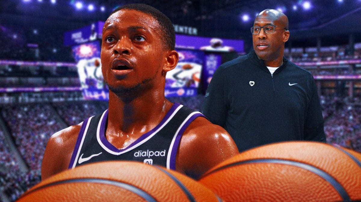 Sacramento Kings star De'Aaron Fox and head coach Mike Brown in front of the Golden 1 Center.