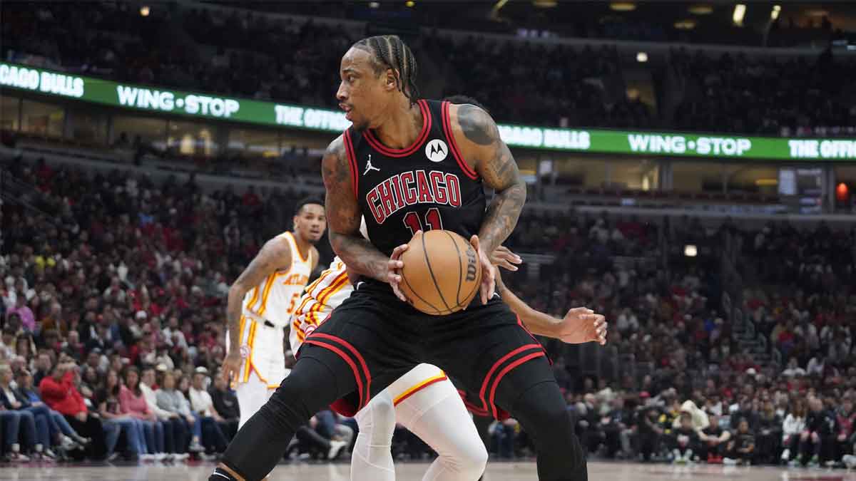 Chicago Bulls forward DeMar DeRozan (11) drives to the basket against the Atlanta Hawks during the first quarter during a play-in game of the 2024 NBA playoffs at United Center.