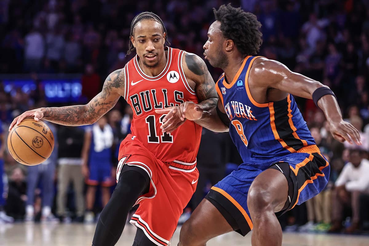 Chicago Bulls forward DeMar DeRozan (11) looks to drive past New York Knicks forward OG Anunoby (8) in the fourth quarter at Madison Square Garden.