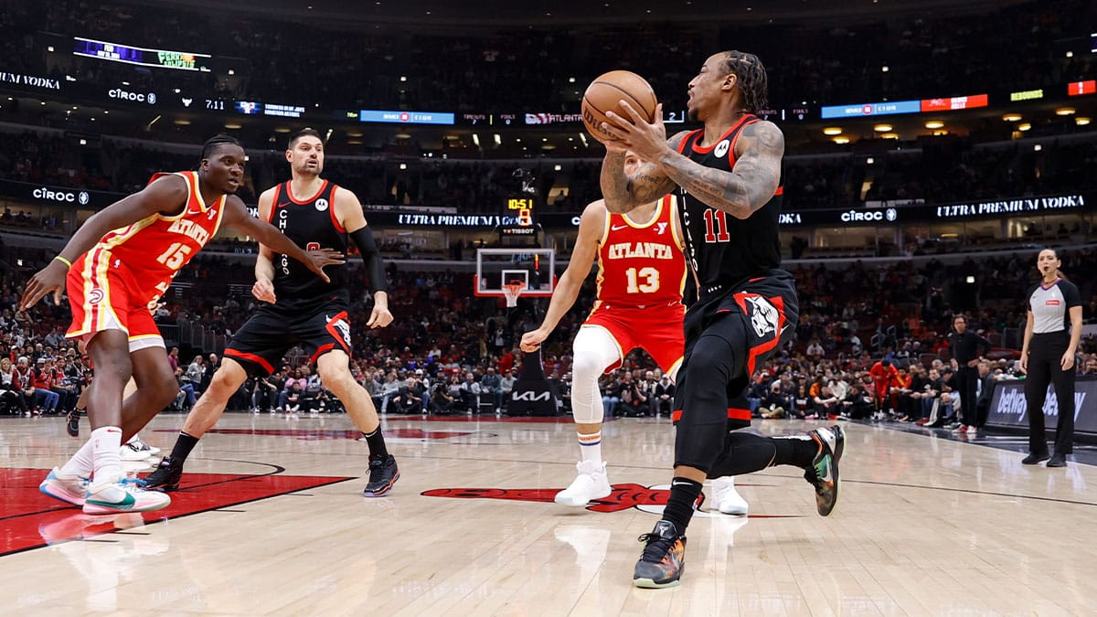 Chicago Bulls forward DeMar DeRozan (11) looks to shoot against the Atlanta Hawks during the first half at United Center. 