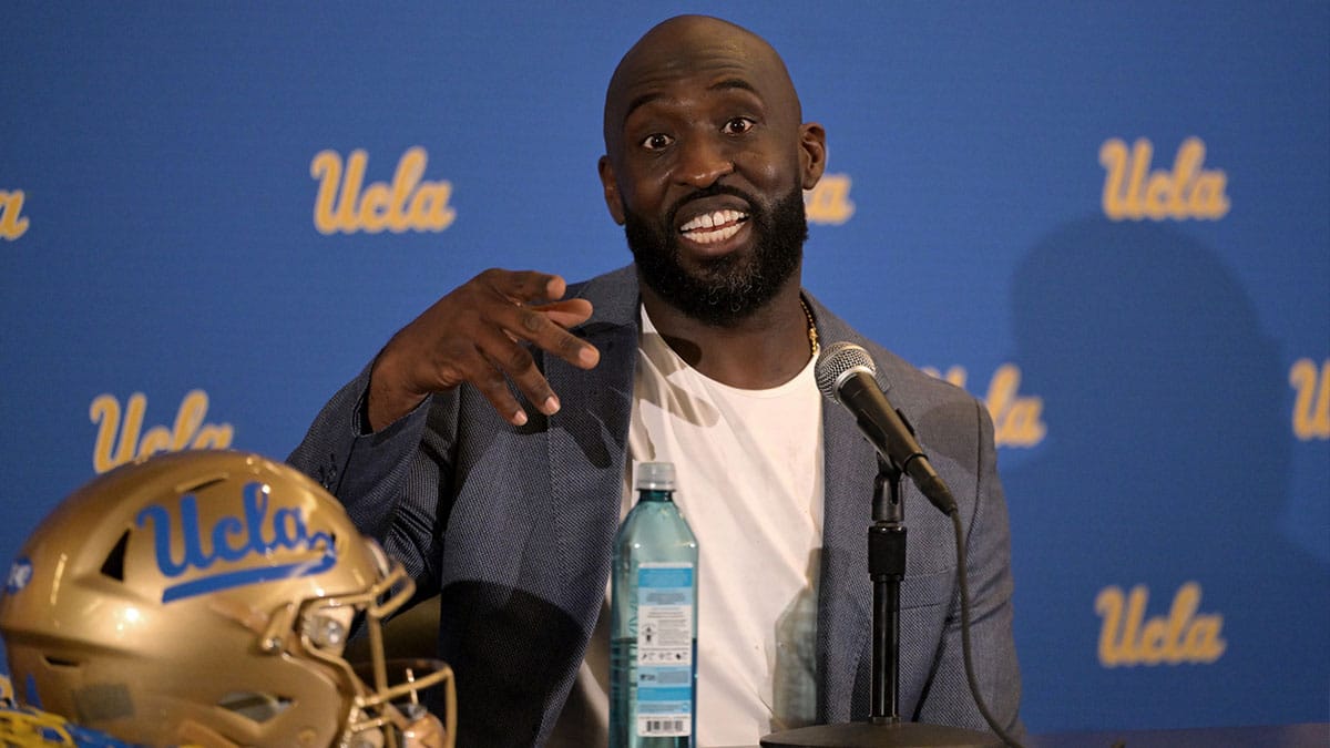 DeShaun Foster answers questions from media after he was introduced as the UCLA Bruins head football coach during a press conference at Pauley Pavilion.