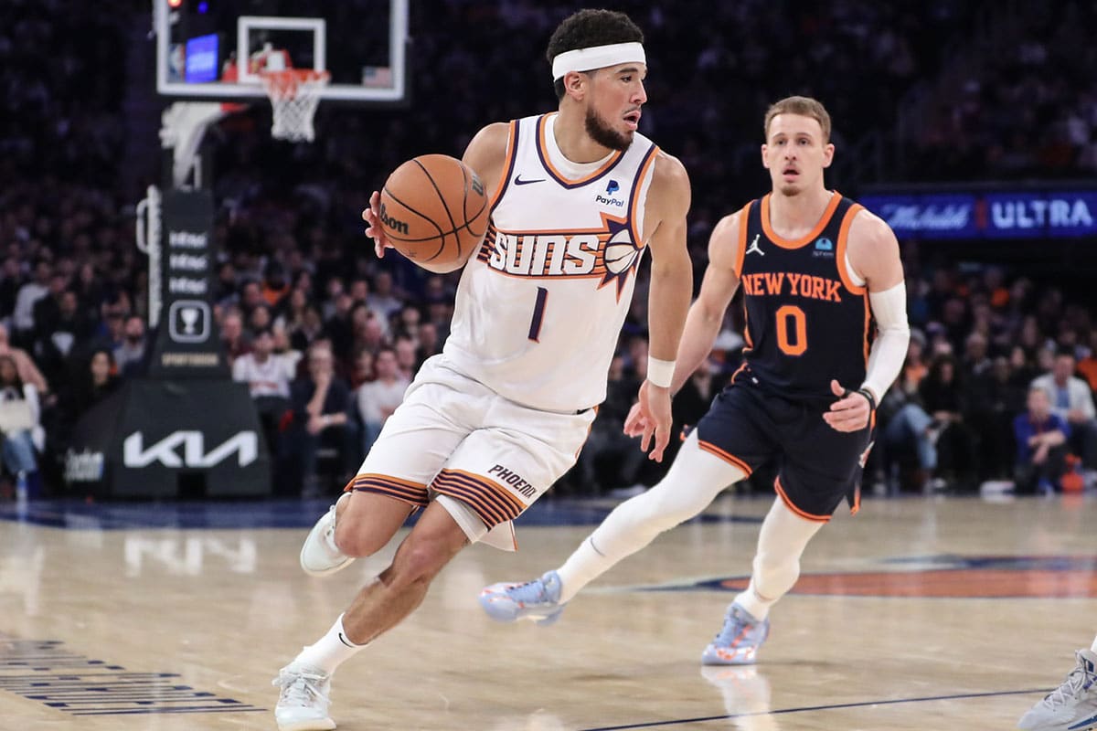 Phoenix Suns player Devin Booker and New York Knicks player Donte DiVincenzo