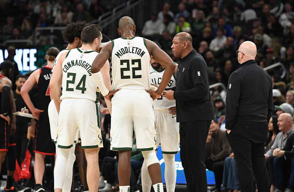 Milwaukee Bucks coach Doc Rivers calls time out late in the second half against Toronto Raptors at Fiserv Forum