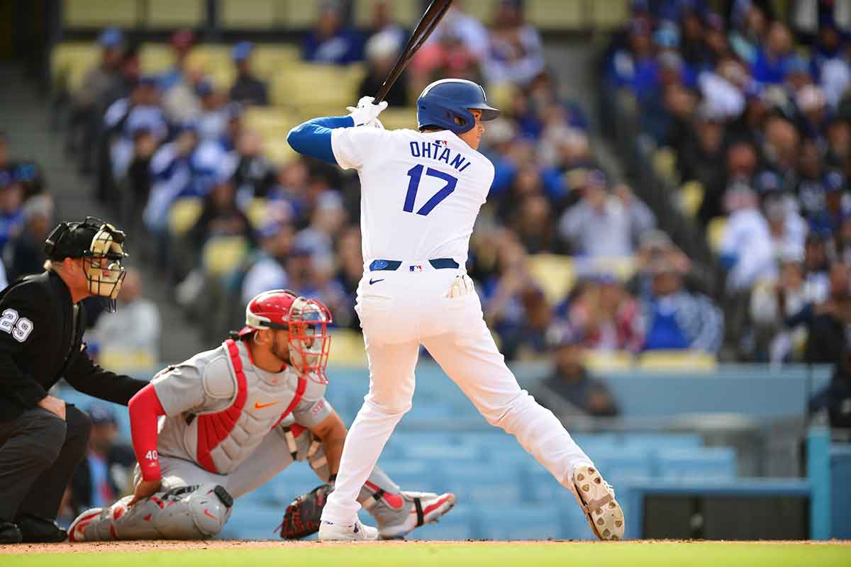 Dodgers designated hitter Shohei Ohtani (17) hits against the St. Louis Cardinals during the first inning at Dodger Stadium.