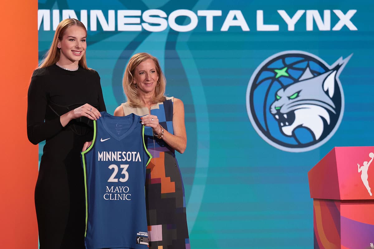 Dorka Juhasz poses for a photo with WNBA Commissioner Cathy Engelbert after being drafted sixteenth overall by the Minnesota Lynx during WNBA Draft 2023 at Spring Studio.