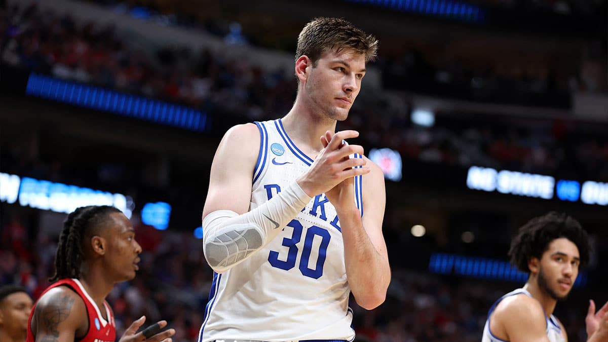Duke Blue Devils center Kyle Filipowski (30) reacts in the first half against the North Carolina State Wolfpack in the finals of the South Regional of the 2024 NCAA Tournament at American Airline Center