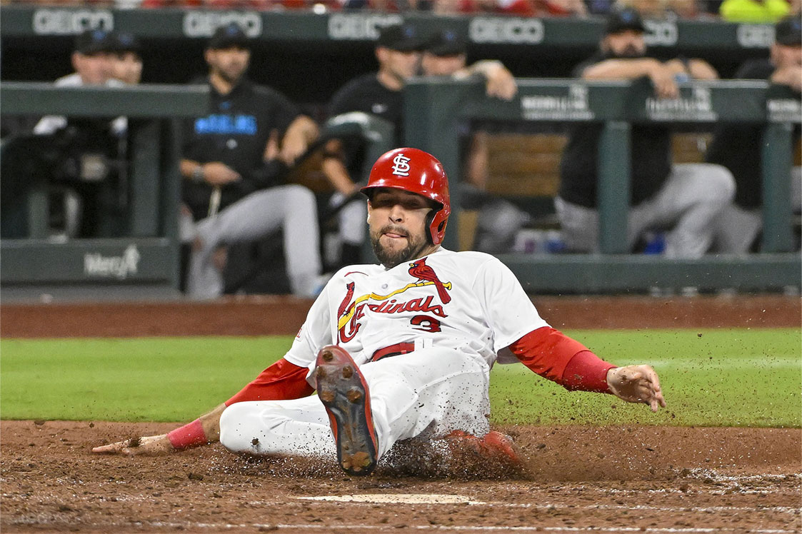 St. Louis Cardinals center fielder Dylan Carlson (3) scores against the Miami Marlins during the seventh inning at Busch Stadium.