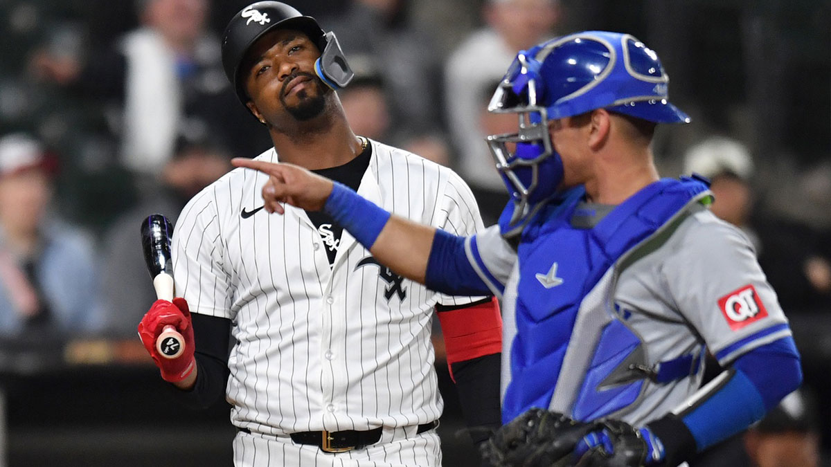 Chicago White Sox pinch hitter Eloy Jimenez (74) reacts after striking out next to Kansas City Royals catcher Freddy Fermin (34) during the ninth inning at Guaranteed Rate Field. All players wore #42 in honor of Jackie Robinson Day. 