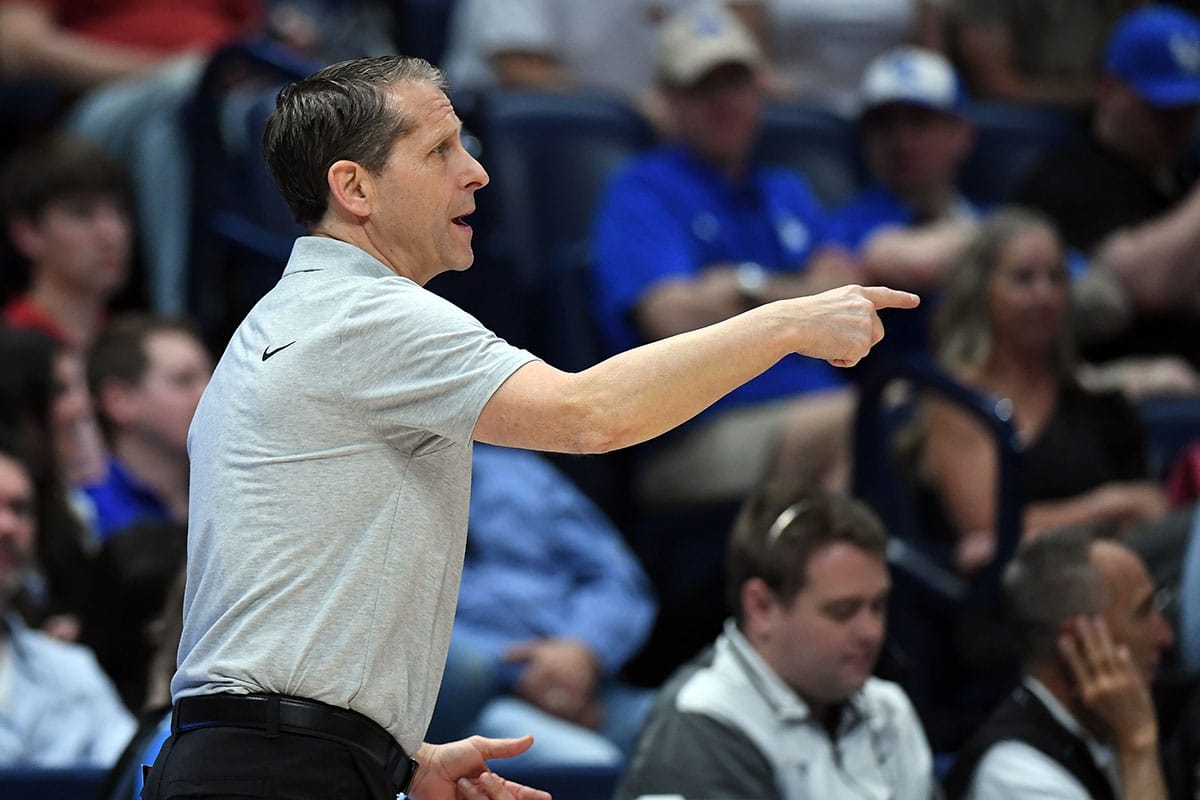 Arkansas Razorbacks head coach Eric Musselman calls in a play from the sideline during the first half against the South Carolina Gamecocks at Bridgestone Arena.