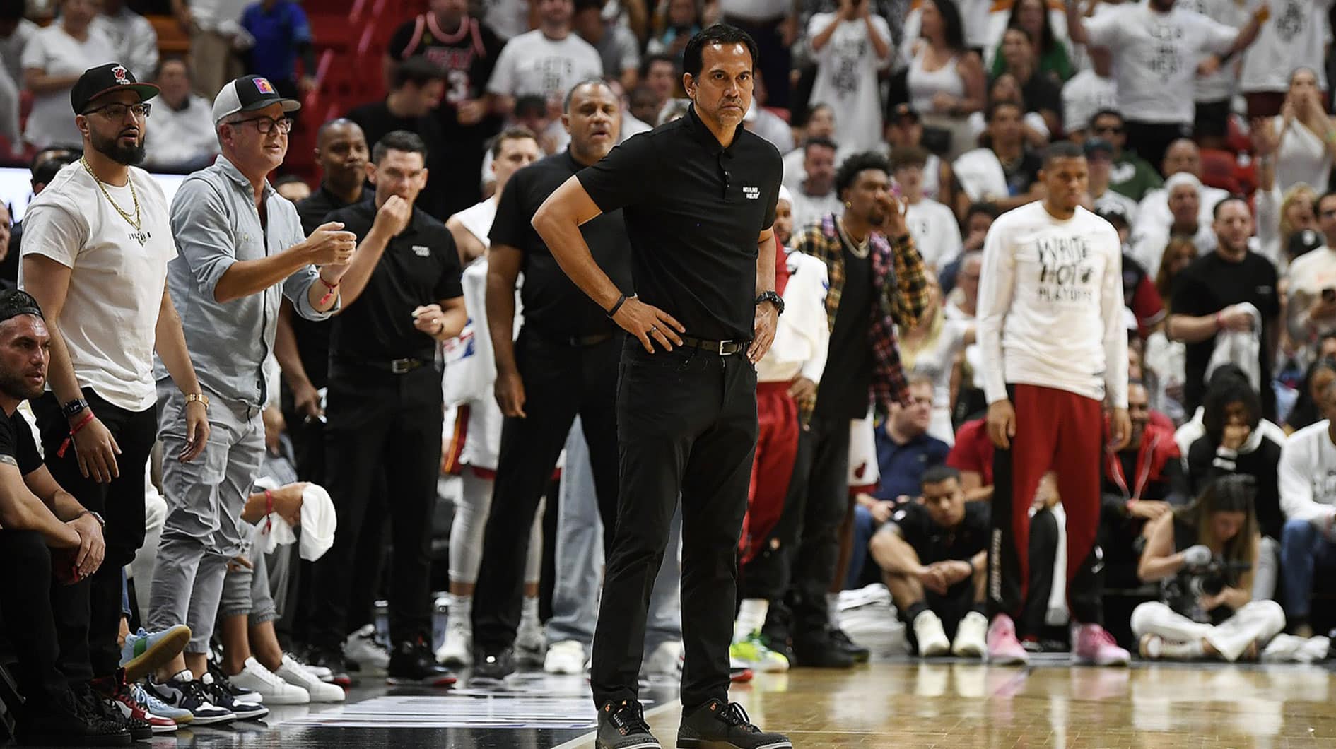 Miami Heat coach Erik Spoelstra, center, watches the Boston Celtics pull ahead of the Heat during the second quarter of game four of the first round for the 2024 NBA playoffs at Kaseya Center. 
