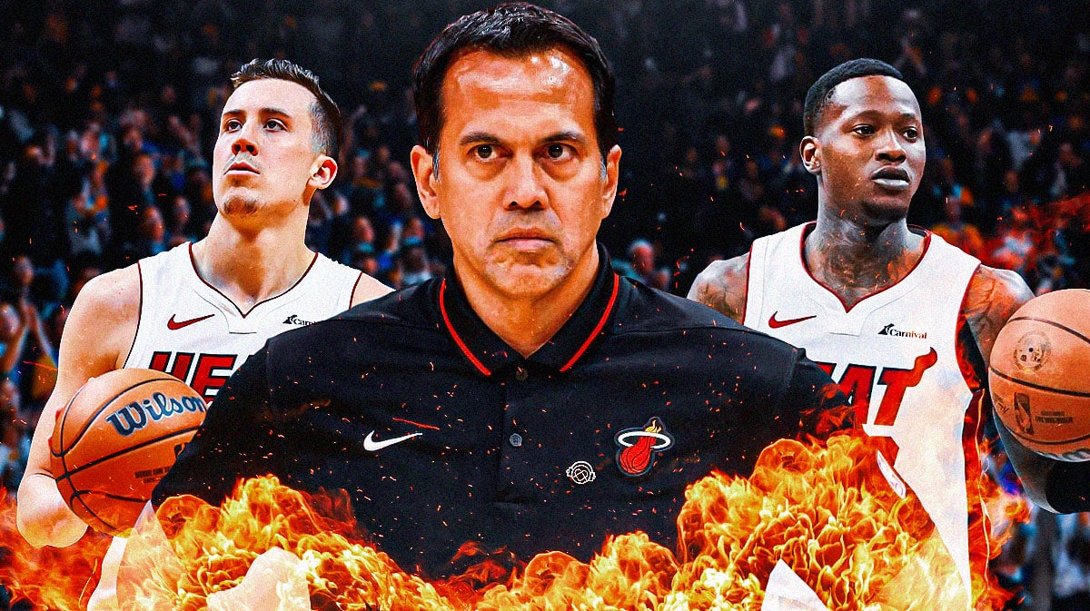 Miami Heat head coach Erik Spoelstra in between stars Duncan Robinson and Terry Rozier.