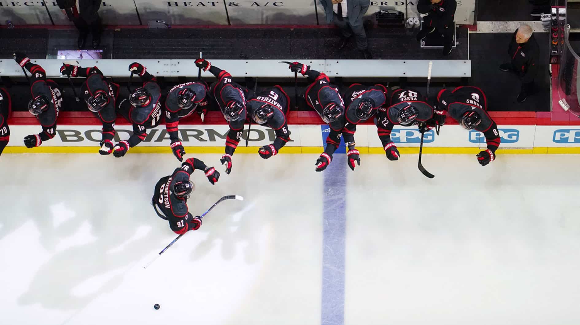 Carolina Hurricanes center Evgeny Kuznetsov (92) is congratulated by his teammates after his goal against the New York Islanders during the first period in game one of the first round of the 2024 Stanley Cup Playoffs at PNC Arena.