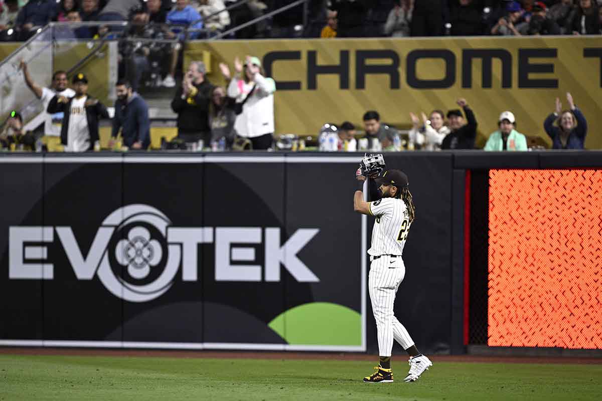 San Diego Padres right fielder Fernando Tatis Jr. (23) acknowledges the fans after taking the field during the ninth inning against the Chicago Cubs at Petco Park. 