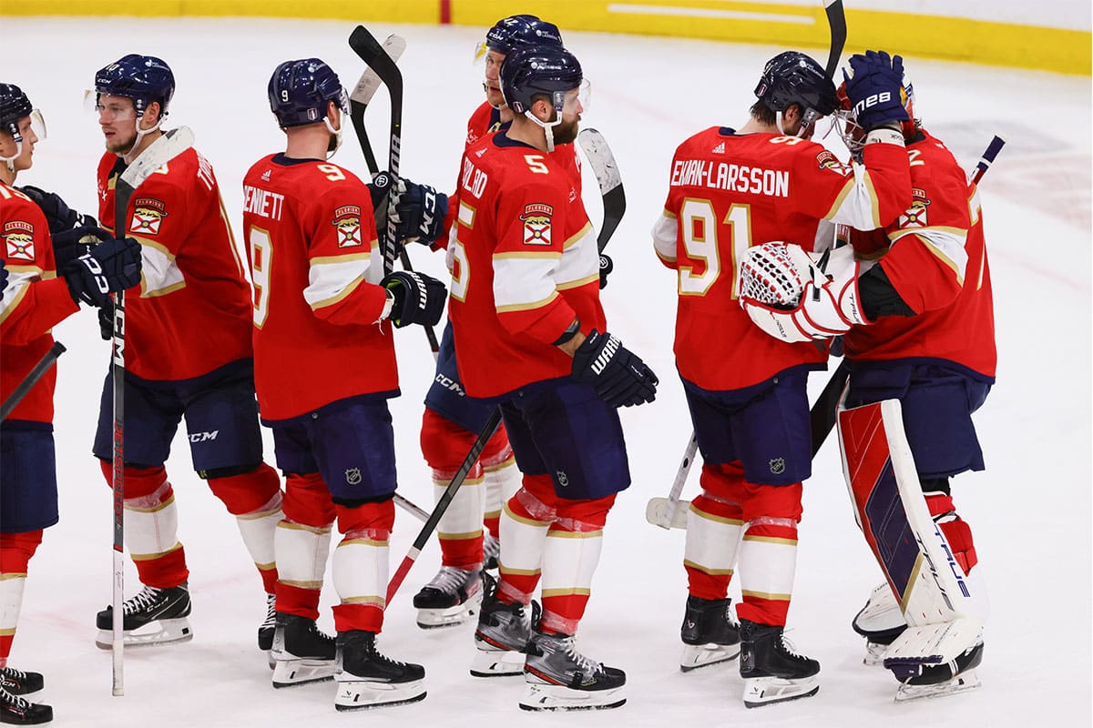 Florida Panthers goaltender Sergei Bobrovsky (72) celebrates with defenseman Oliver Ekman-Larsson (91) after defeating the Tampa Bay Lightning in game one of the first round of the 2024 Stanley Cup Playoffs at Amerant Bank Arena.