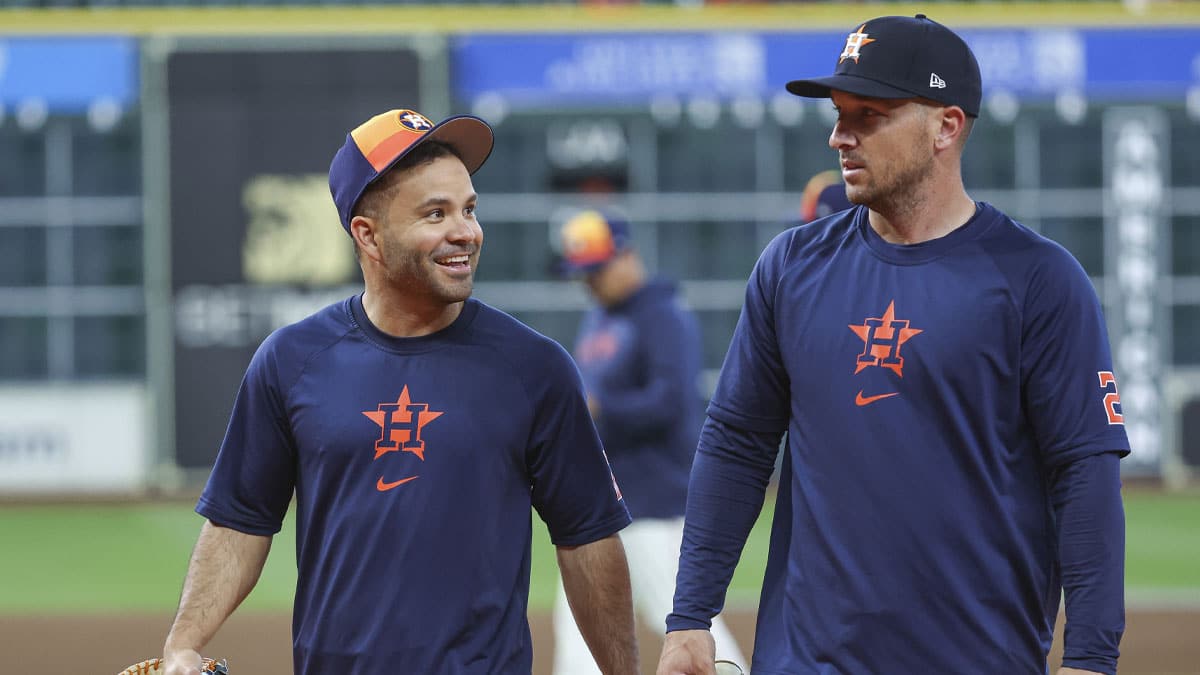 Houston Astros second baseman Jose Altuve (27) talks with third baseman Alex Bregman (2) before the game against the New York Yankees at Minute Maid Park.