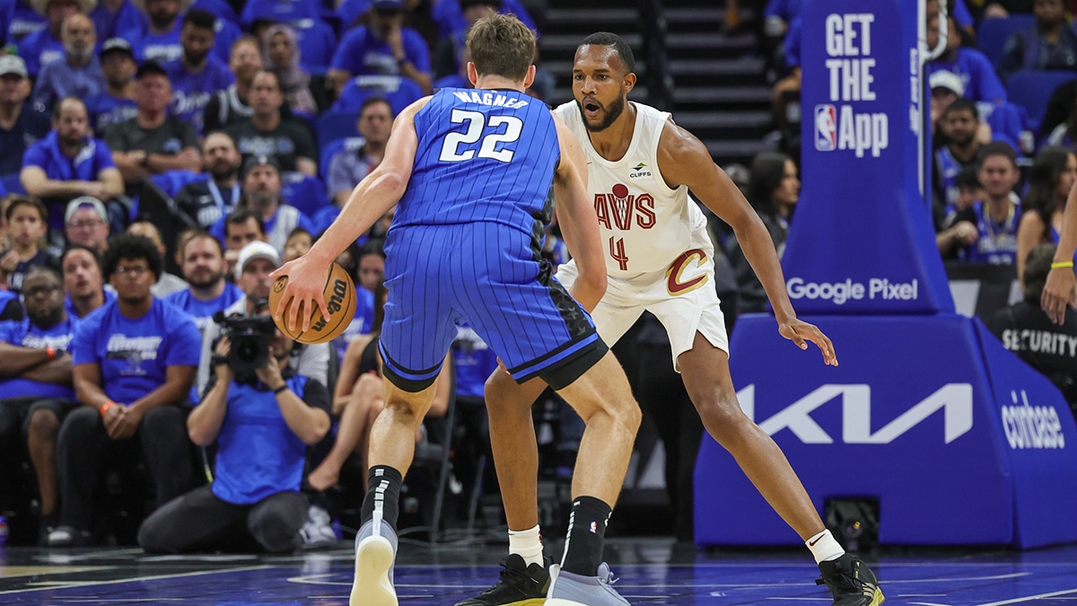 Cleveland Cavaliers forward Evan Mobley (4) defends Orlando Magic forward Franz Wagner (22) during the first quarter of game three of the first round for the 2024 NBA playoffs at Kia Center.