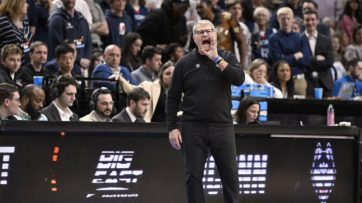 UConn Huskies head coach Geno Auriemma shouts to his players during the second half against the USC Trojans in the finals of the Portland Regional of the NCAA Tournament at the Moda Center.