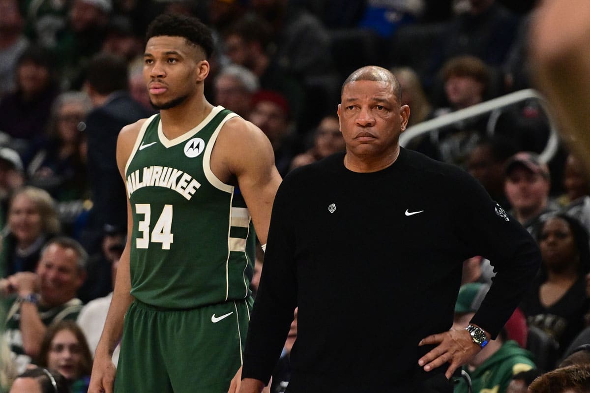 Milwaukee Bucks head coach Doc Rivers and forward Giannis Antetokounmpo (34) looks on in the fourth quarter against the Memphis Grizzlies at Fiserv Forum.