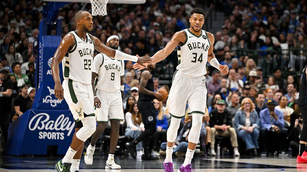 Milwaukee Bucks forward Khris Middleton (22) and forward Giannis Antetokounmpo (34) during the game between the Dallas Mavericks and the Milwaukee Bucks at the American Airlines Center.