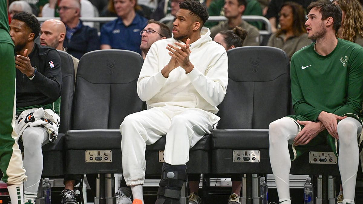 Milwaukee Bucks forward Giannis Antetokounmpo (34) sits on the bench with a calf injury in the second quarter against the Orlando Magic at Fiserv Forum. 