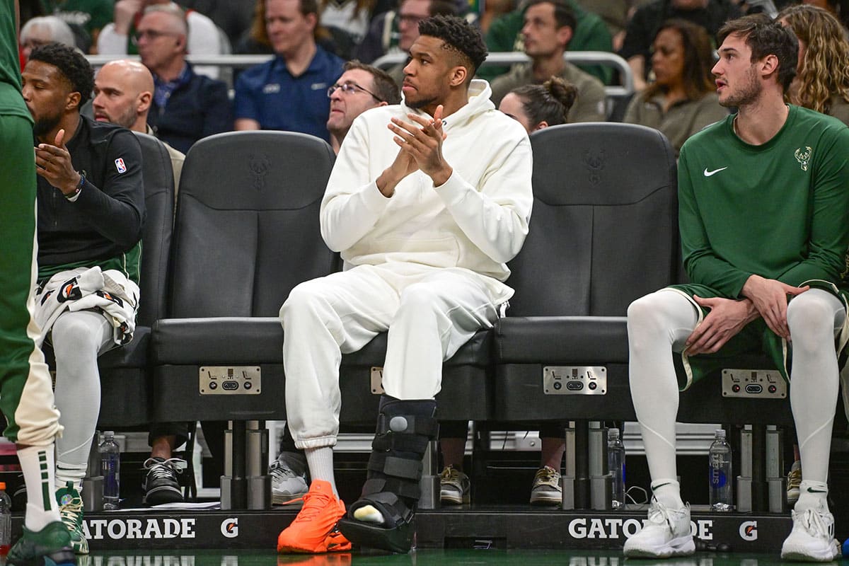Milwaukee Bucks forward Giannis Antetokounmpo (34) sits on the bench with a calf injury in the second quarter against the Orlando Magic at Fiserv Forum.