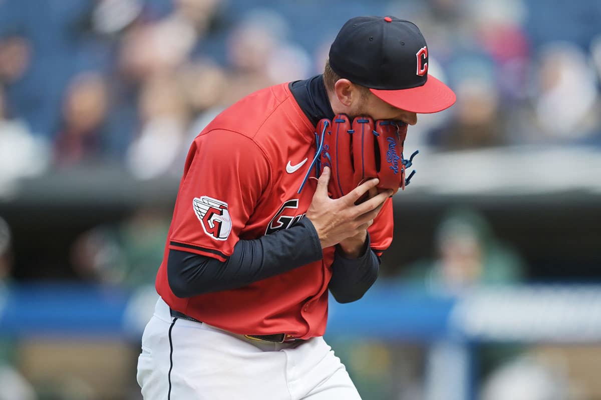 Cleveland Guardians starting pitcher Tanner Bibee (28) reacts after being relieved during the sixth inning against the Oakland Athletics at Progressive Field.