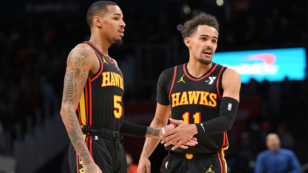 Atlanta Hawks guard Dejounte Murray (5) and guard Trae Young (11) celebrate during the second half against the Washington Wizards at Capital One Arena.
