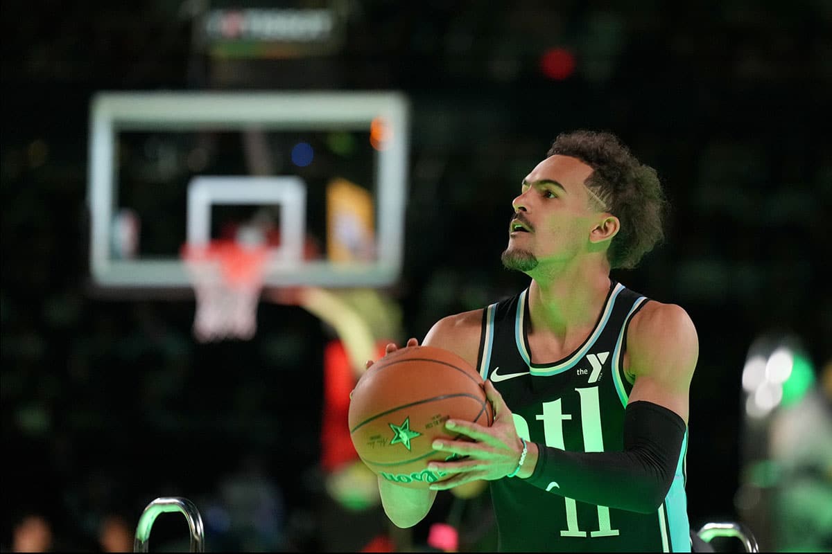 Atlanta Hawks guard Trae Young (11) shoots the ball during the three-point contest during NBA All Star Saturday Night at Lucas Oil Stadium.