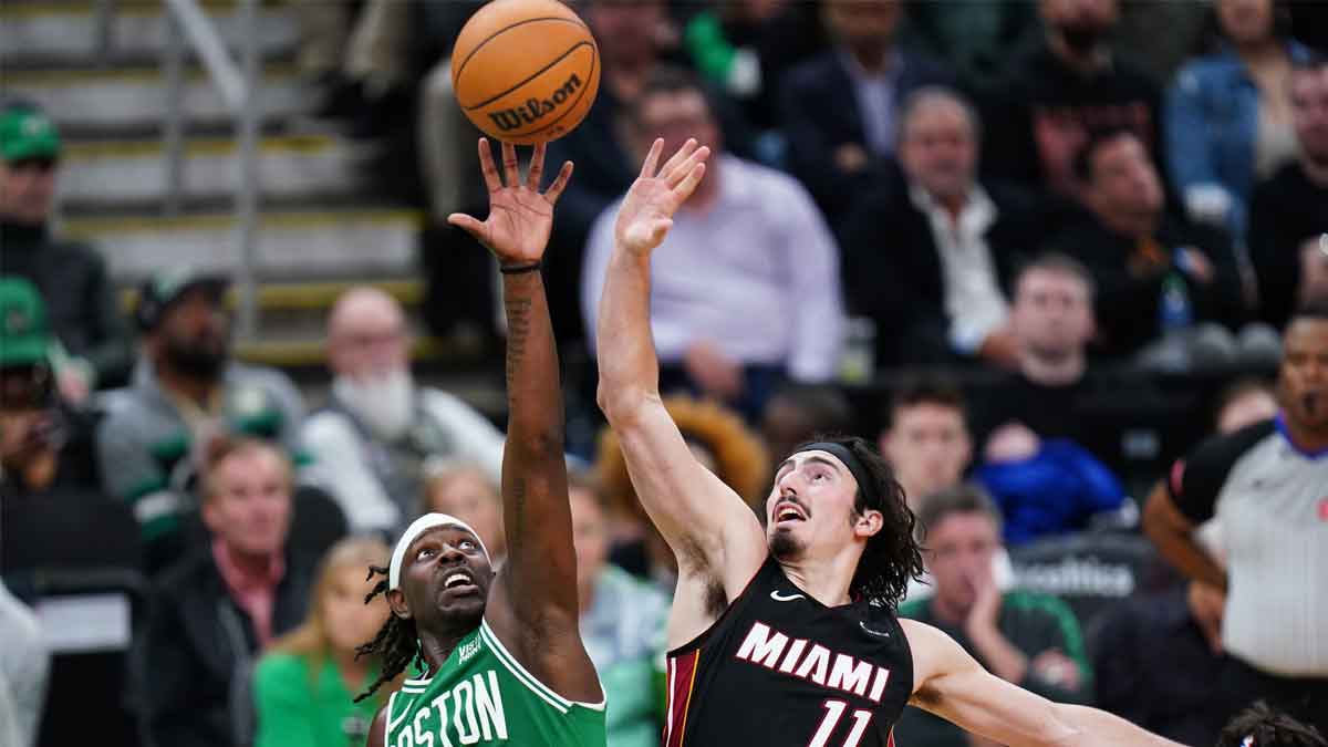 Jump ball against Boston Celtics guard Jrue Holiday (4) and Miami Heat guard Jaime Jaquez Jr. (11) in the second half during game two of the first round for the 2024 NBA playoffs at TD Garden.