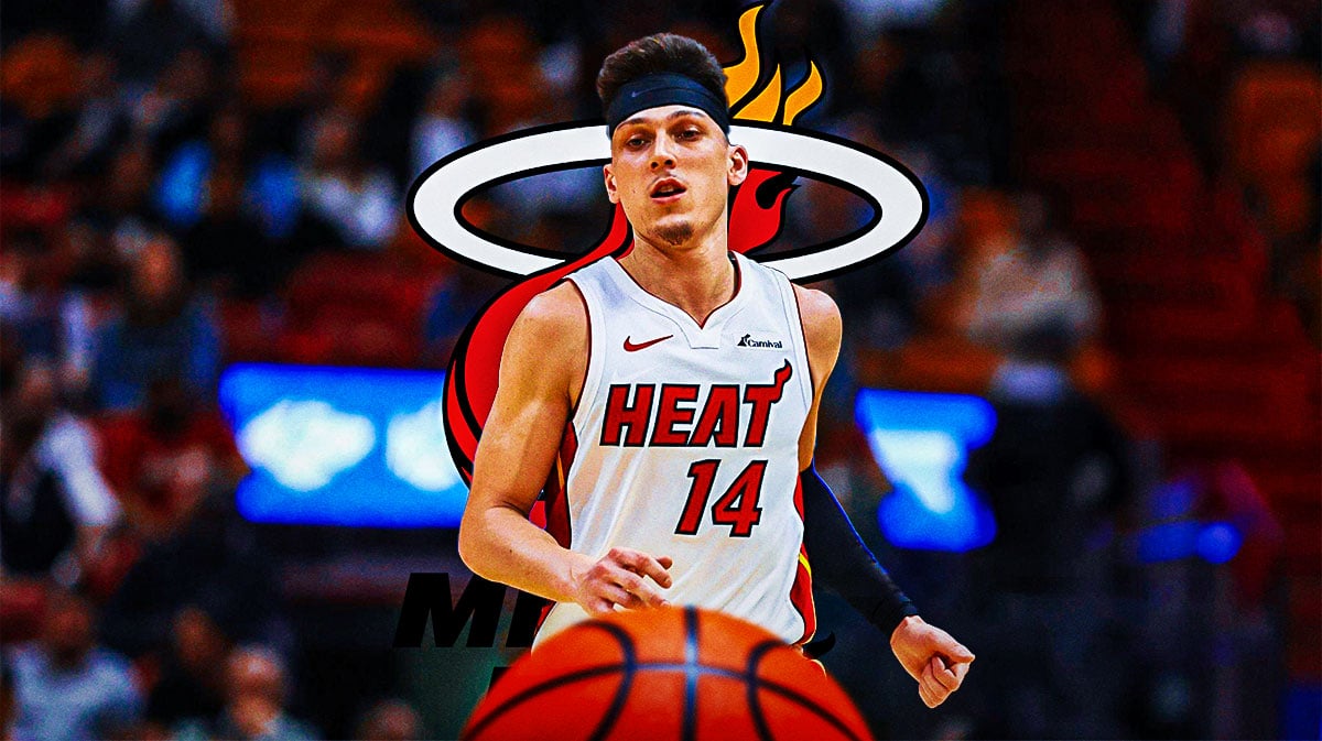Miami Heat star Tyler Herro in front of the Kaseya Center.