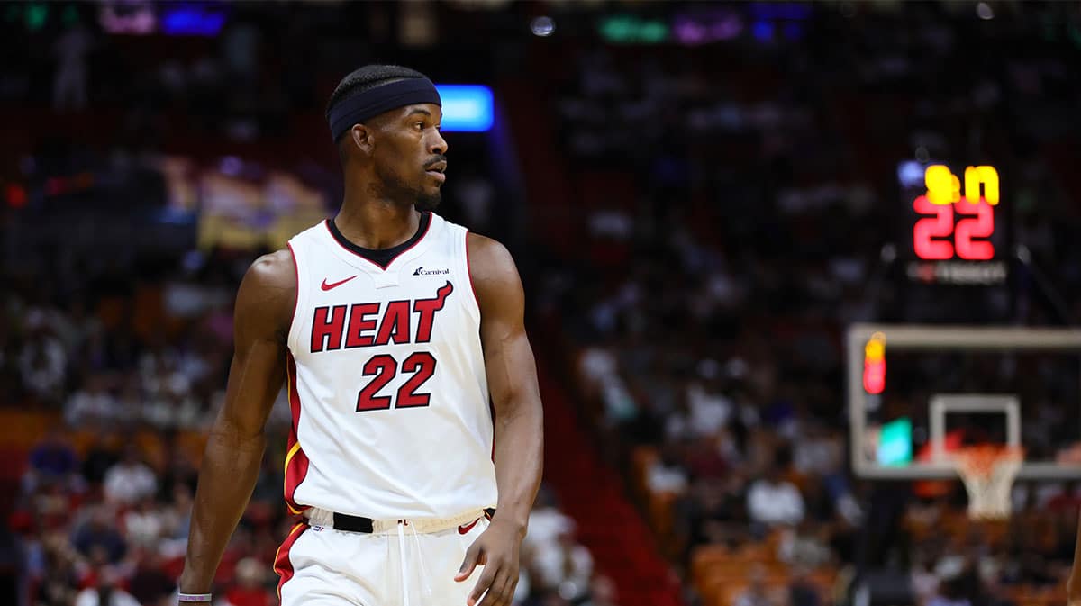 Miami Heat forward Jimmy Butler (22) looks on against the Portland Trail Blazers during the first quarter at Kaseya Center.