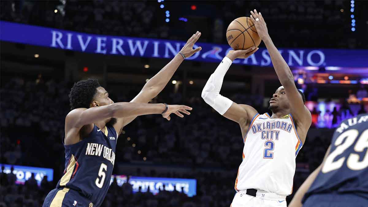 Oklahoma City Thunder guard Shai Gilgeous-Alexander (2) shoots as New Orleans Pelicans forward Herbert Jones (5) defends during the fourth quarter of game one of the first round for the 2024 NBA playoffs at Paycom Center