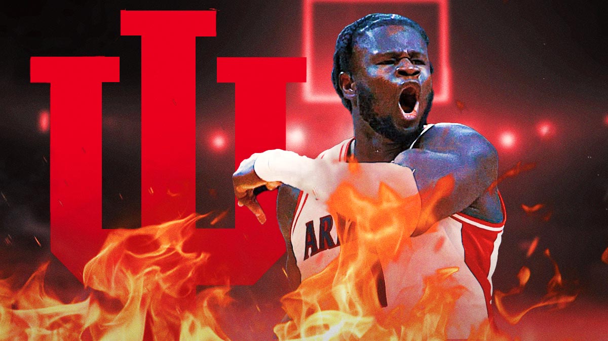 Oumar Ballo next to the Indiana basketball logo