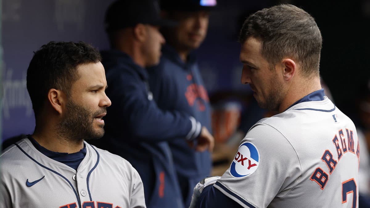  Houston Astros second base Jose Altuve (27) talks with Astros third base Alex Bregman (2) in the dugout prior to their game against the Washington Nationals at Nationals Park.