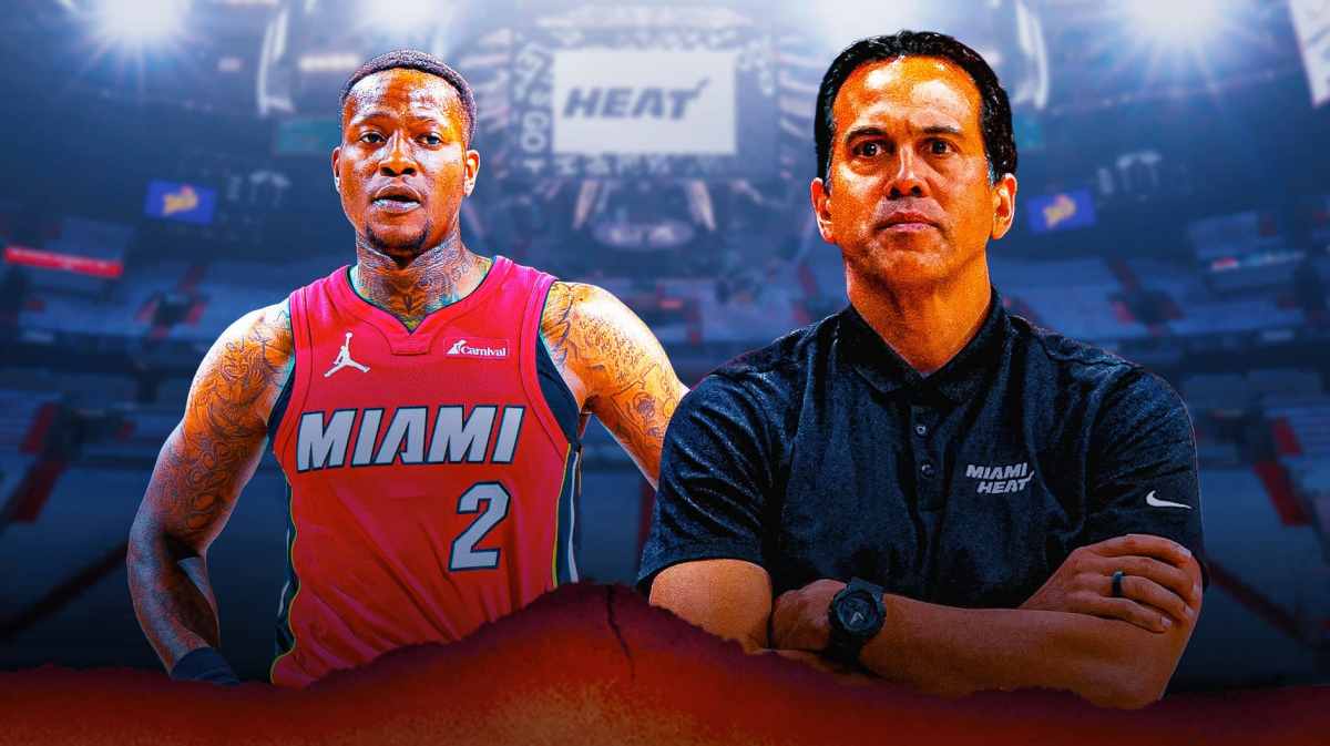 Miami Heat star Terry Rozier next to head coach Erik Spoelstra in front of the Kaseya Center.
