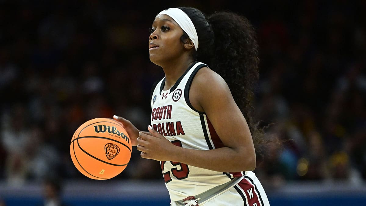 South Carolina Gamecocks guard Raven Johnson (25) dribbles the ball against the NC State Wolfpack in the semifinals of the Final Four of the womens 2024 NCAA Tournament at Rocket Mortgage FieldHouse.