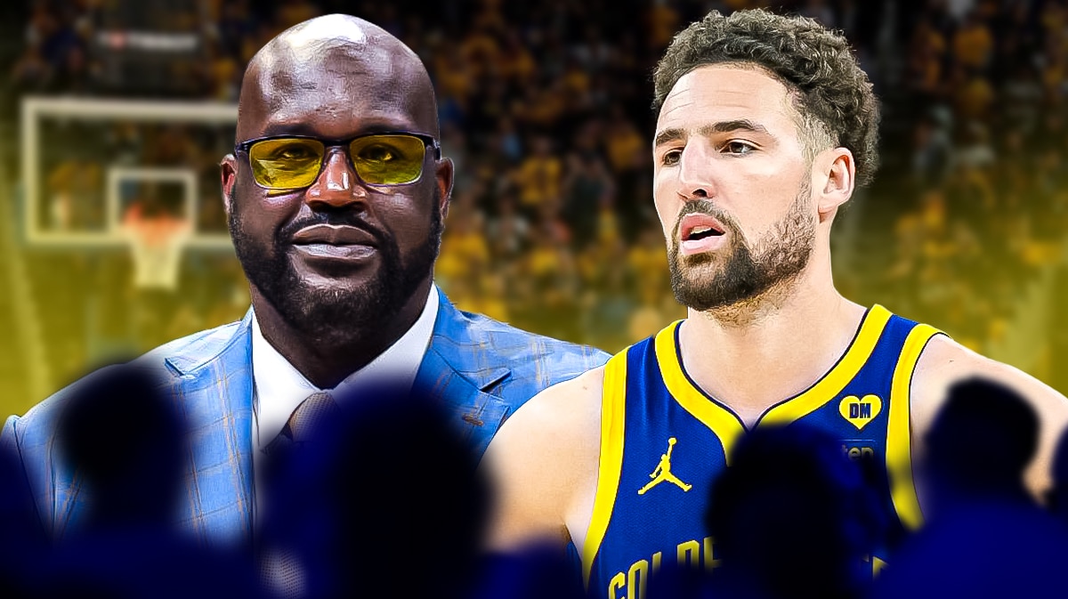 Shaquille O’Neal alongside Klay Thompson with the Warriors arena in the background