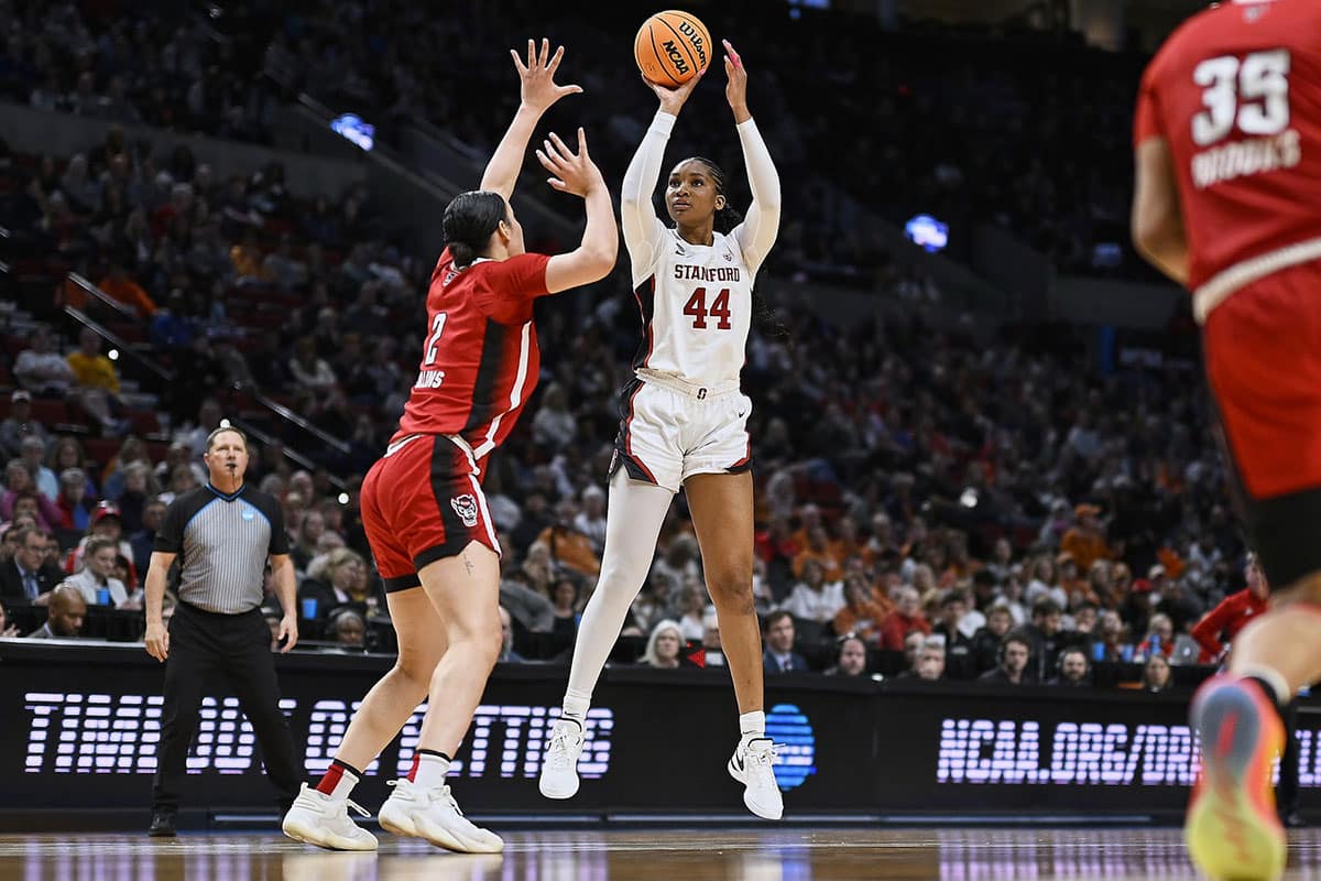 Stanford Cardinal forward Kiki Iriafen (44) shoots a jump shot during the second half against NC State Wolfpack forward Mimi Collins (2) in the semifinals of the Portland Regional of the 2024 NCAA Tournament at the Moda Center at the Moda Center. 