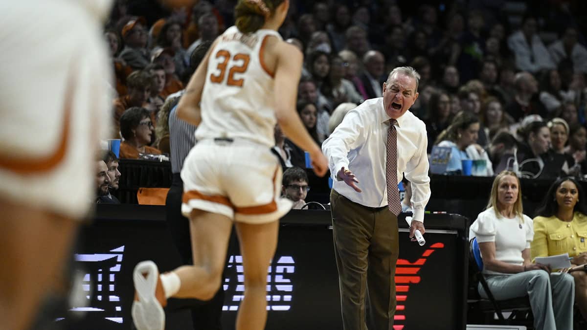 Texas Longhorns head coach Vic Schaefer yells during the second half against the NC State Wolfpack in the finals of the Portland Regional of the NCAA Tournament.