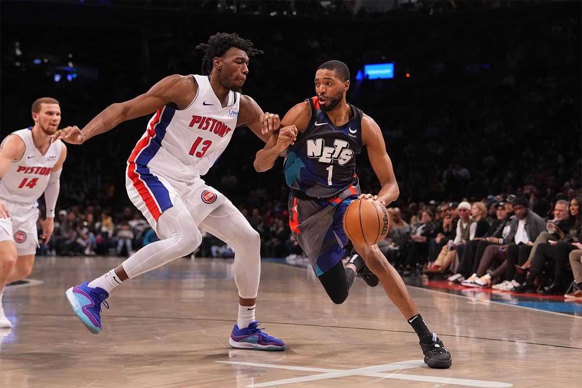 Brooklyn Nets small forward Mikal Bridges (1) dribbles the ball against Detroit Pistons center James Wiseman (13) during the second half at Barclays Center.