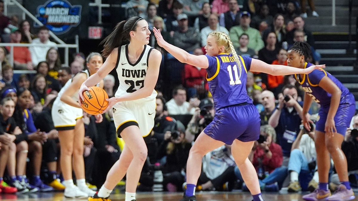 Iowa Hawkeyes guard Caitlin Clark (22) controls the ball against LSU Lady Tigers guard Hailey Van Lith (11) in the second quarter in the finals of the Albany Regional in the 2024 NCAA Tournament