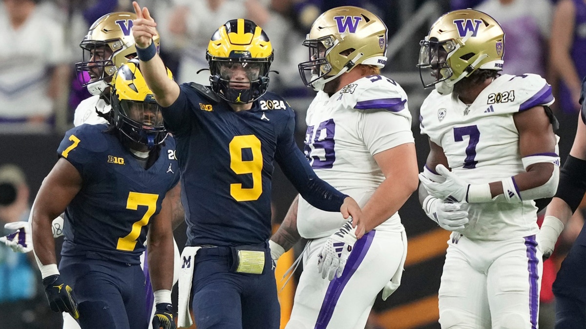  Michigan quarterback J.J. McCarthy points down the field during the second half of the College Football Playoff national championship game against Washington