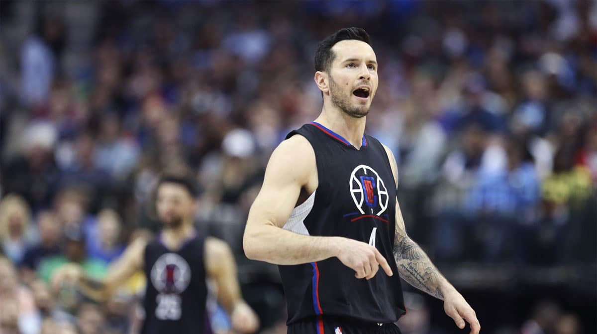 LA Clippers guard JJ Redick (4) reacts after scoring during the first half against the Dallas Mavericks at American Airlines Center.