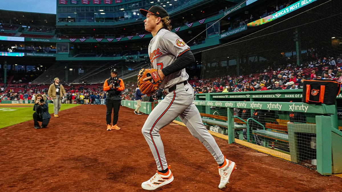 Baltimore Orioles shortstop Jackson Holliday (7) runs onto the field before the start of the game against the Boston Red Sox at Fenway Park.