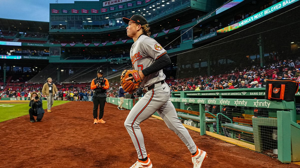 Baltimore Orioles shortstop Jackson Holliday (7) runs onto the field before the start of the game against the Boston Red Sox at Fenway Park.
