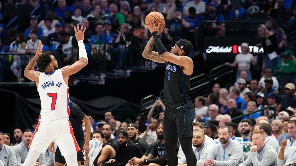 Dallas Mavericks guard Jaden Hardy (1) scores a basket against Detroit Pistons forward Troy Brown Jr. (7) during the second half at American Airlines Center.