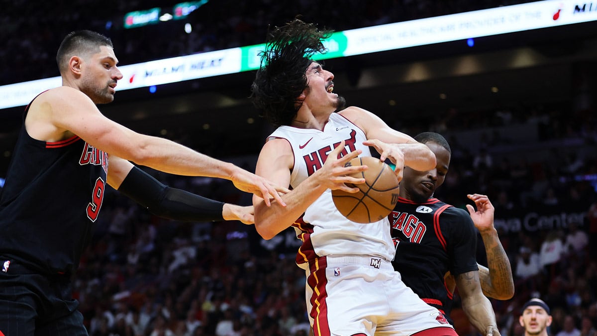 Miami Heat guard Jaime Jaquez Jr. (11) drives to the basket against the Chicago Bulls in the fourth quarter during a play-in game of the 2024 NBA playoffs at Kaseya Center.