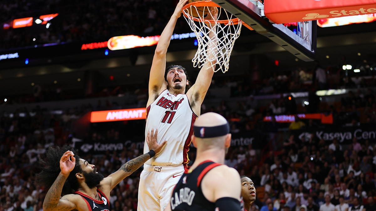 Miami Heat guard Jaime Jaquez Jr. (11) dunks the basketball against the Chicago Bulls in the fourth quarter during a play-in game of the 2024 NBA playoffs at Kaseya Center.
