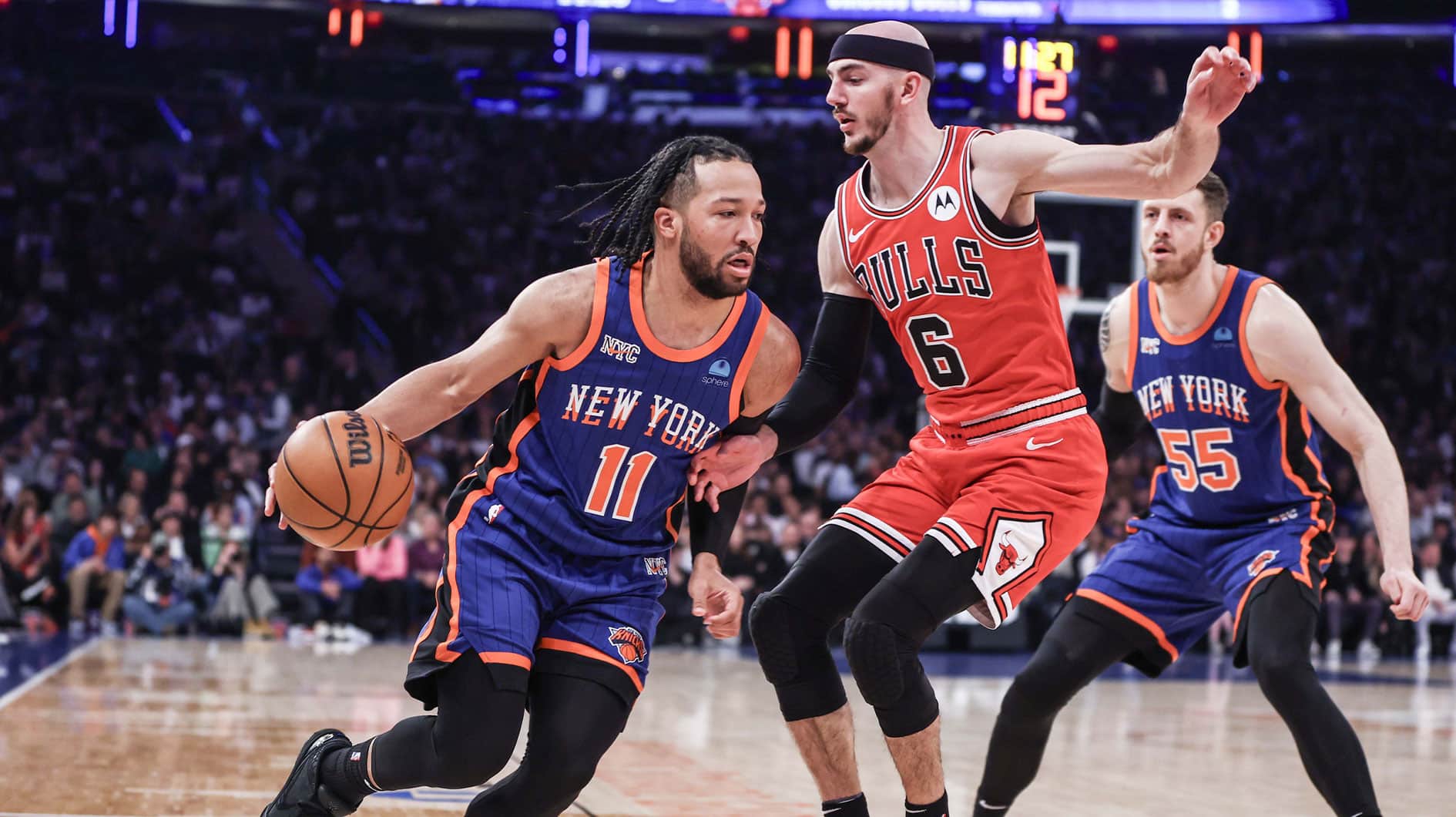 New York Knicks guard Jalen Brunson (11) drives past Chicago Bulls guard Alex Caruso (6) in the first quarter at Madison Square Garden