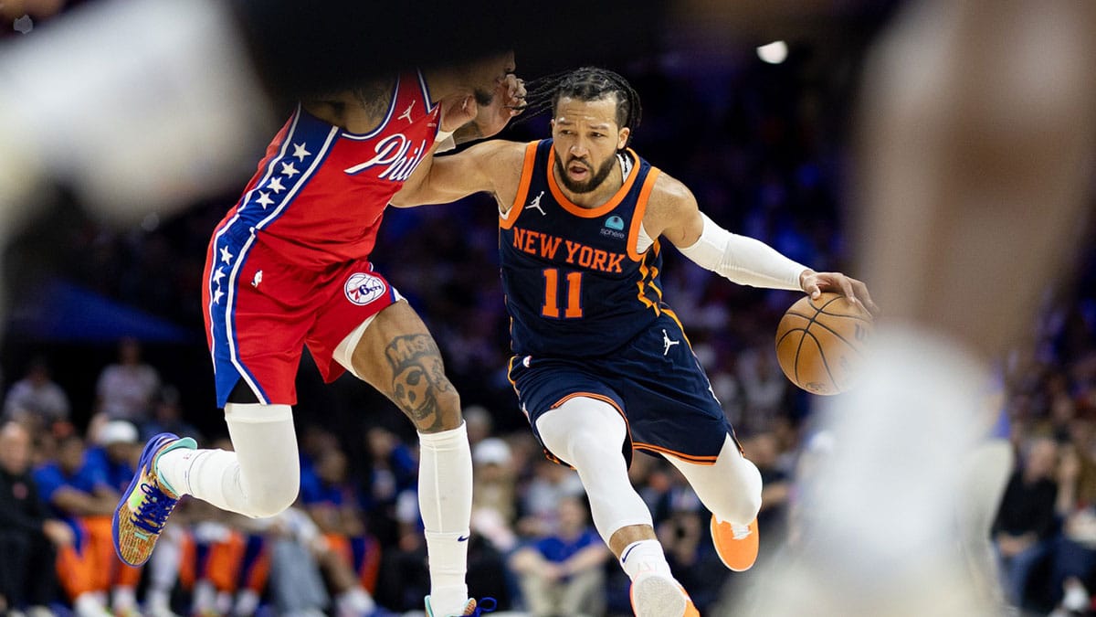 New York Knicks guard Jalen Brunson (11) drives against Philadelphia 76ers guard Kelly Oubre Jr. (9) during the second half of game four of the first round in the 2024 NBA playoffs at Wells Fargo Center.